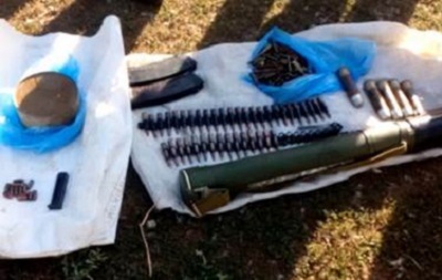 В Донецкой области обнаружен тайник с оружием
